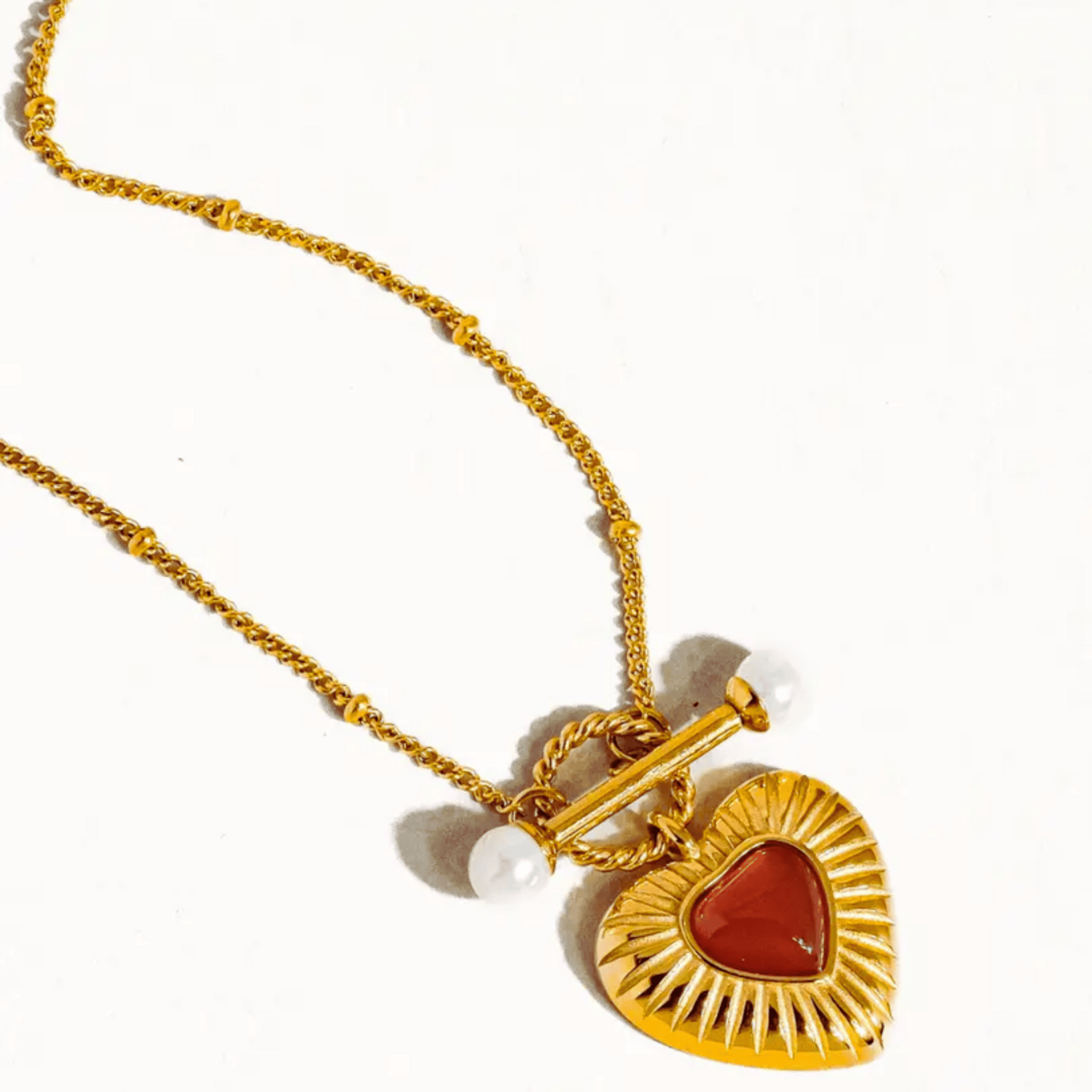 The Relic Necklace - Vintage Gold Heart Pendant with Red Gemstone