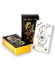 A tarot card deck and box with a new moon and stars theme, featuring black and gold colors.