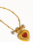 The Relic Necklace - Vintage Gold Heart Pendant with Red Gemstone